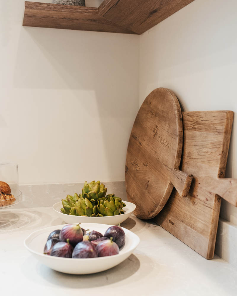 wooden chopping boards and figs