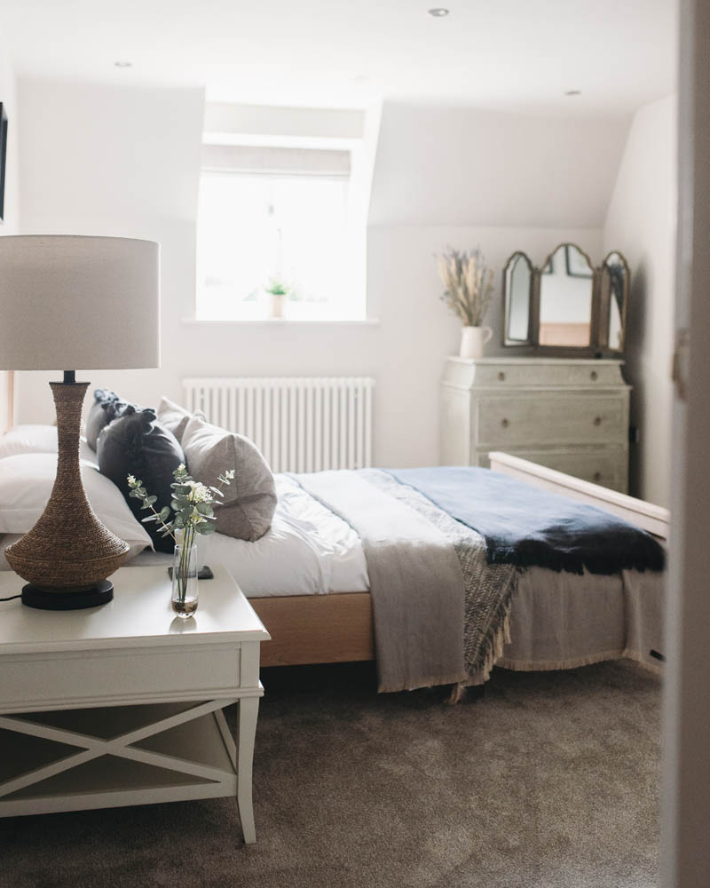 interior designer bedroom with grey carpet
